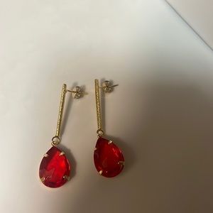 Red earrings bought in Brazil